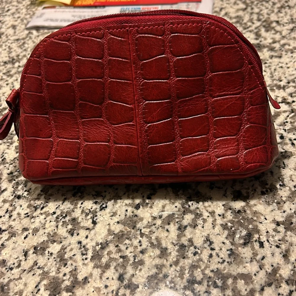 Velez Red Leather(?) Zippered Make-Up Bag w/Silver Lining. 8” W x 4 1/2” H. Good